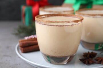 Delicious Christmas liqueur on tray, closeup view