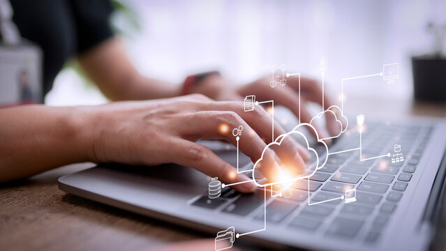 Woman use Laptop with cloud computing diagram show on hand. Cloud technology. Data storage. Networking and internet service concept.