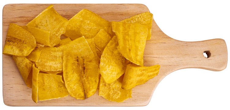 Crispy Banana Chips. Fried or baked sliced banana. Top view of typical traditional dish of Latin American gastronomy called Chifles or fried tostones. Roasted banana. Snack.