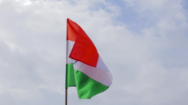 4k video of Indian national flag swaying in wind during celebration of independence day. Tricolor flag consists of saffron white and green color with blue wheel in the middle.