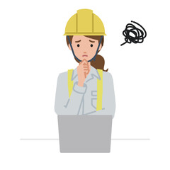 デスクで座ってPCを開いて困っている工事現場の女性