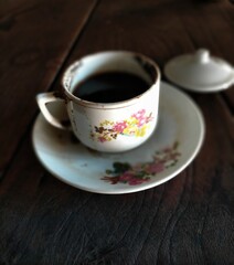 cup of coffee on black background 