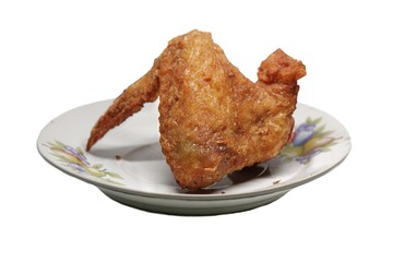 fried chicken wings in white plate