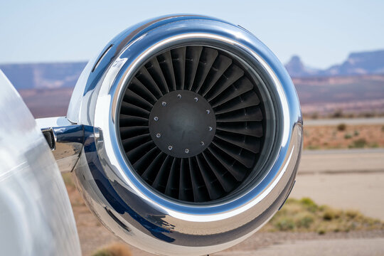 Closeup of an airplane turbine engine on a private jet