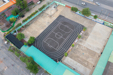 Aerial top view of soccer football sport recreation field ground, national stadium. Urban city town...