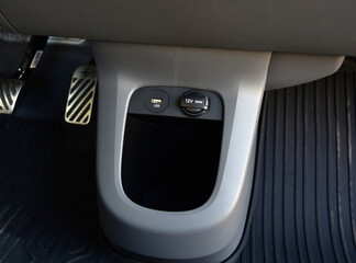 12V socket and USB port on car dashboard