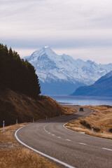 View of the majestic Aoraki Mount Cook with the road leading to Mount Cook Village. Taken during winter in New Zealand.
