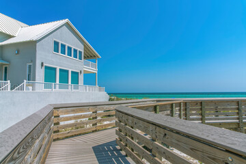 Beach house view from a boardwalk on a beach at Destin, Florida