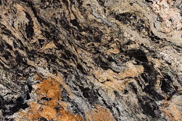  Magma gold natural granite stone texture, photo of slab. oft matt Italian stone texture for interior, exterior home decoration, floor tiles and ceramic wall tiles surface. Natural matt pattern. © Dmytro Synelnychenko