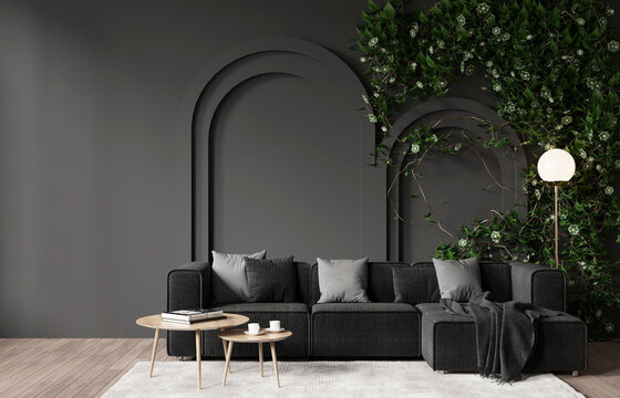 Mock-up interior design of a living room in a modern style. Wooden floor, dark gray wall with plants. Furnished with sofa and coffee table. 3d rendering	