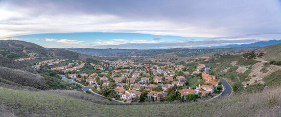 Wealthy suburban neighborhood from a hiking trail at San Clemente, California - obrazy, fototapety, plakaty