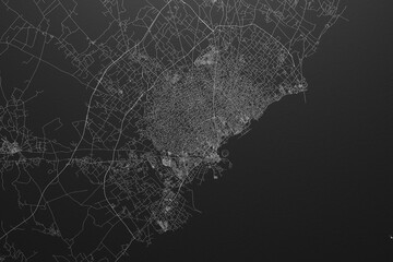 Street map of Sfax (Tunisia) on black paper with light coming from top