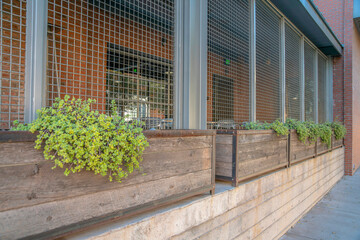 Wooden planters outside a restaurant building at Phoenix, Arizona
