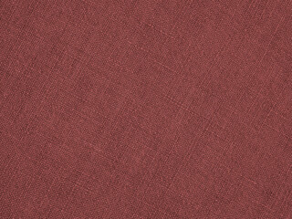 Brown woven surface close-up. Linen net texture. Dark fabric len background. Textured woven braided...