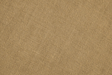 Light brown woven surface close up. Linen textile texture. Fabric handicraft glamorous background....