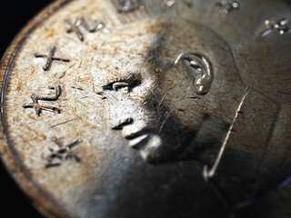 Translation: 2010. 1 one Taiwanese dollar or yuan. Fragment of textured coin. Taiwan money....