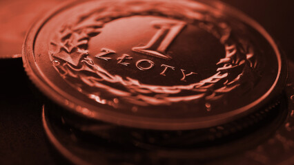 Translation: 1 zloty. Polish one zloty coin close-up. National currency and money of Poland. Dark...