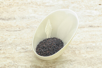 Black sesame seeds in the bowl