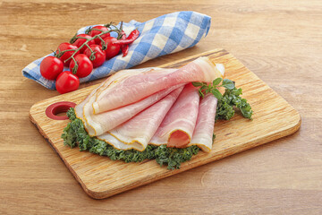 Pork ham snack over board