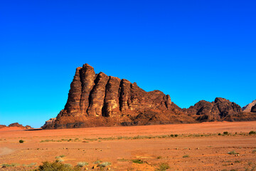 Amazing desert landscape. Beautiful landscape of desert mountains. Monolithic mountains in the central part of the desert. Wadi Rum, Jordan.