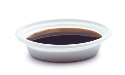 sushi, maki rolls and soy sauce on a white background