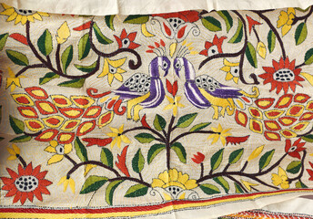 Closeup of of intricately embroidered Tussar sari, (traditional dress worn by Indian women). This...