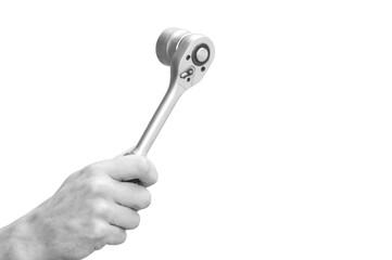 place for text on the background of a wrench in a hand. the banner depicts hands holding tools.hand of the master holds an adjustable wrench