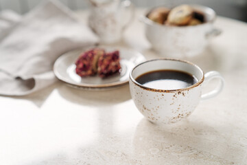 Cup of coffee and turkish sweetness on background. Sweet food and drink 