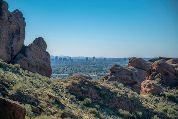View of buildings from the hiking trail at Camelback Mountain in Phoenix, Arizona