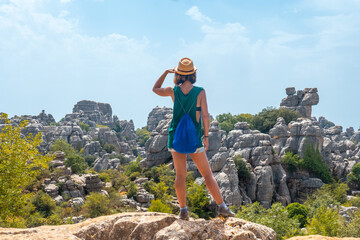 Looking at the landscape of Torcal de Antequera on the green and yellow trail enjoying freedom,...
