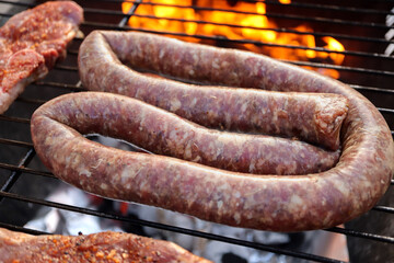 South African braai. Boerewors sausage and lamb chops on the grill