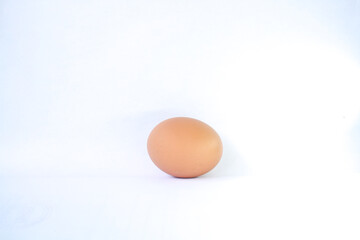 One chicken egg. Isolated on white background