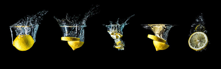 Set of lemons with splashes of water isolated on black background. Collection of lemons falling into the water. Big size.