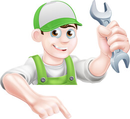 Man Holding Spanner and Pointing