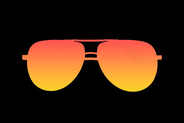 Silhouette of sunglasses in the colors of the setting sun on a black background