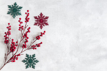 Christmas composition. Fir tree branches, red berries on gray background. Christmas, winter, new year concept. Flat lay, top view, copy space - 529806006