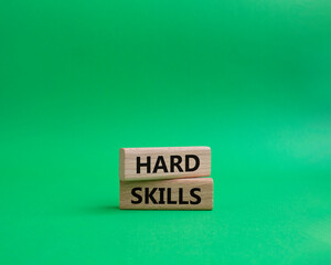 Hard skills symbol. Wooden blocks with words Hard skills. Beautiful green background. Business and Hard skills concept. Copy space.