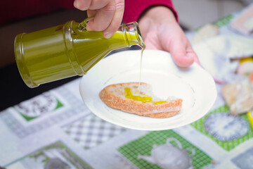 What a healthy and delicious appetizer : extra virgin olive oil on bread