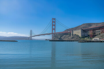 View of the Golden Gate Bridge from the shore against the clear blue sky at San Francisco, CA