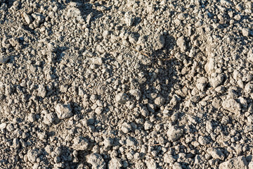Close-up of loosened fertile soil in the farmland.
