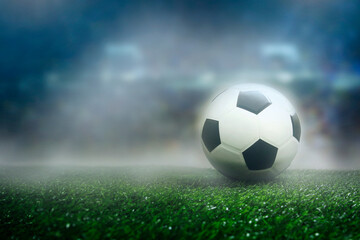 Fototapeta na wymiar soccer ball on the pitch in football stadium