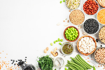 Beans, legumes and green sprouts. Dried, raw and fresh, top view. Red beans, lentils, chickpeas, soybeans. Healthy, nutritious, diet food, vegan protein, micronutrients and fiber sources - obrazy, fototapety, plakaty