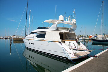 Fototapeta premium Luxury yacht mooring in a harbour