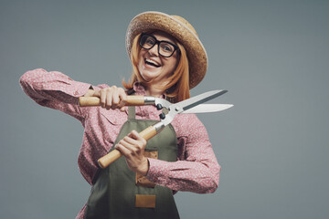 Woman posing with hedge shears