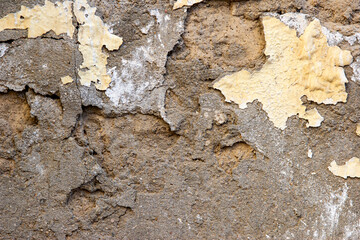 Old concrete wall with paint residue, texture