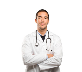 Confident doctor against white background