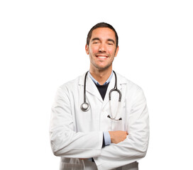 Confident doctor against white background