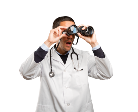 Surprised doctor using a binoculars against white background