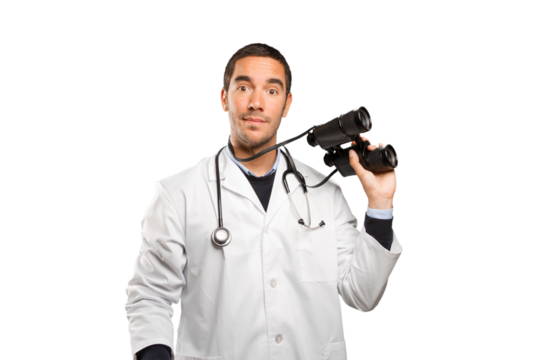 Surprised doctor using a binoculars against white background