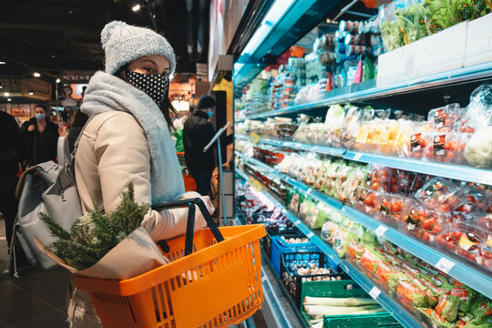 Woman In Winter Outfit Do Groceries Shopping